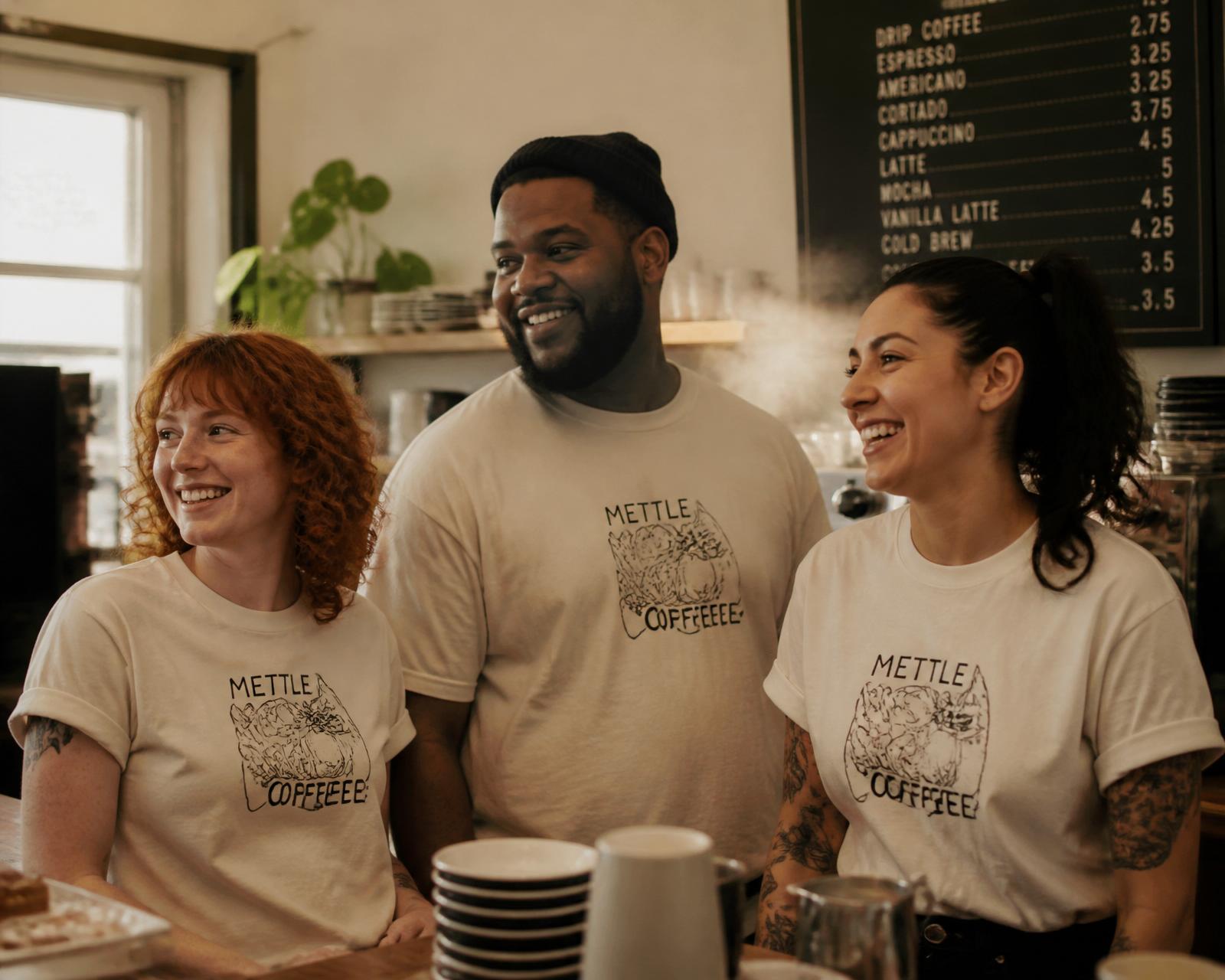 Cafe staff wearing custom-printed shop tees by CC Print